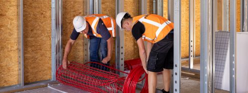 HVAC Installers installing prefab underfloor heating mats | Pipelife