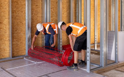 HVAC Installers installing prefab underfloor heating mats | Pipelife